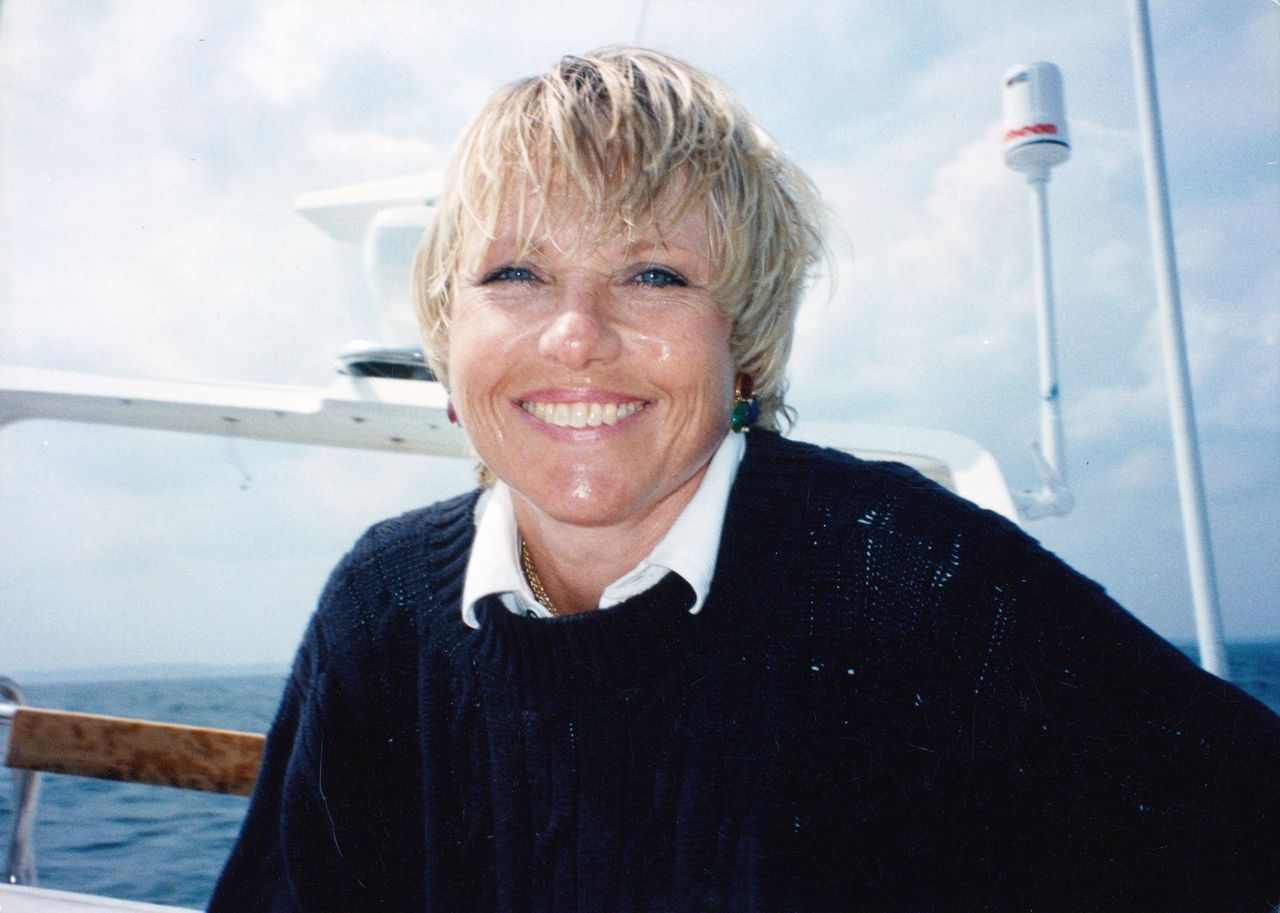 Eva Tucci smiling aboard a boat, 1993