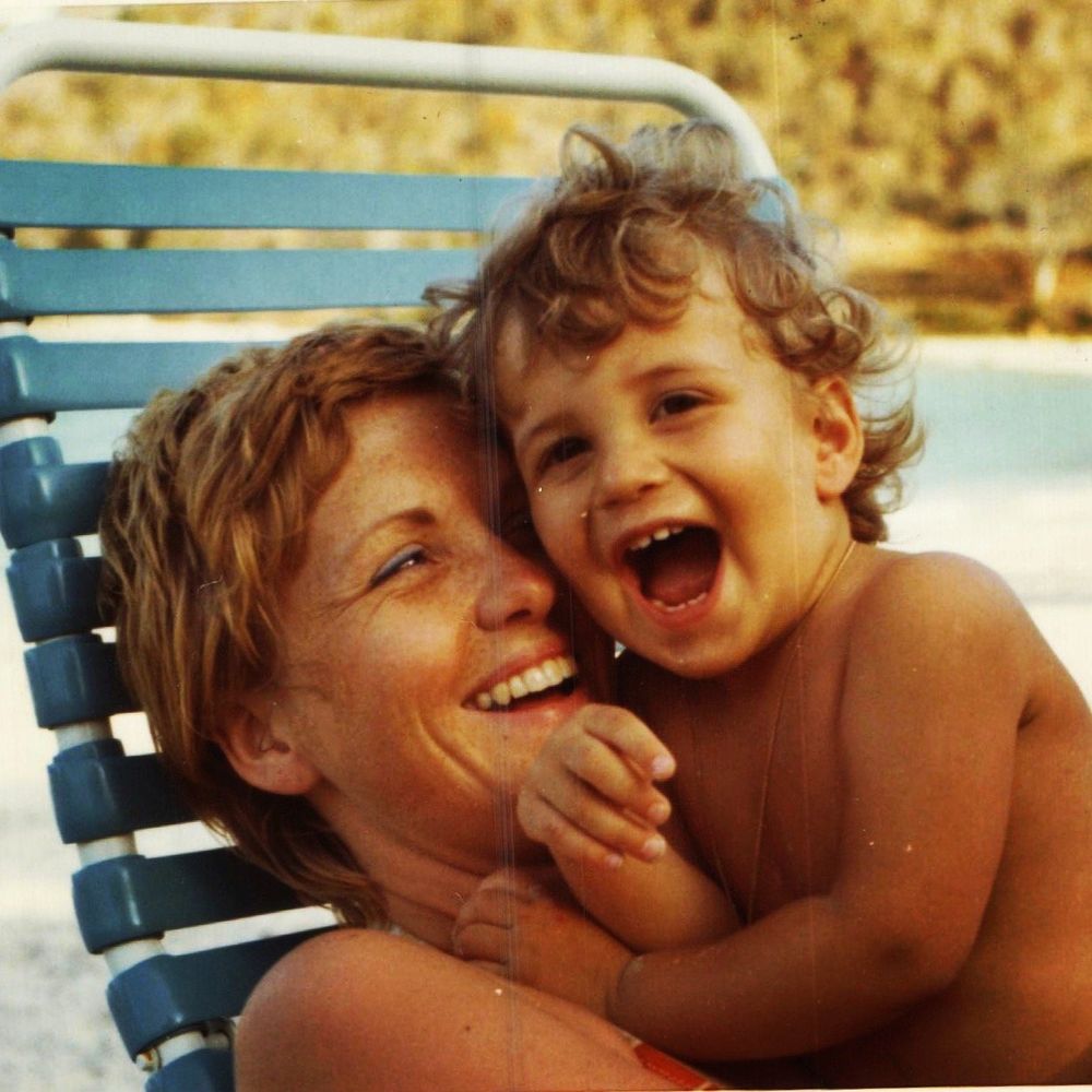 Eva laughing with baby Michael