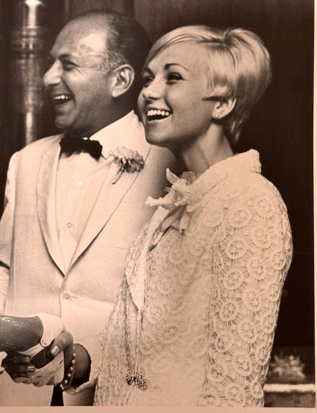 Eva with her husband, dressed for an evening out